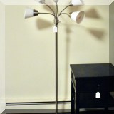 D25. One of a pair of multi-light floor lamps. 